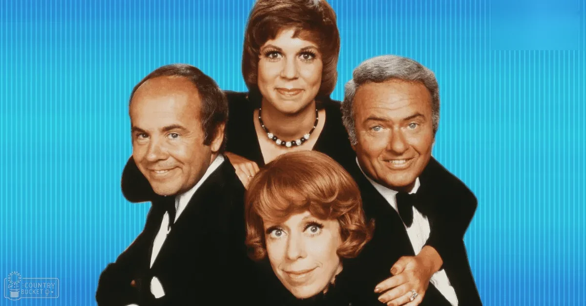 Promotional television show image with studio setting, blue background, vertical lines, adult male in dark suit, middle-aged female in dark dress with pearl necklace, older male in dark suit and bow tie, older female in dark outfit with short red hair.