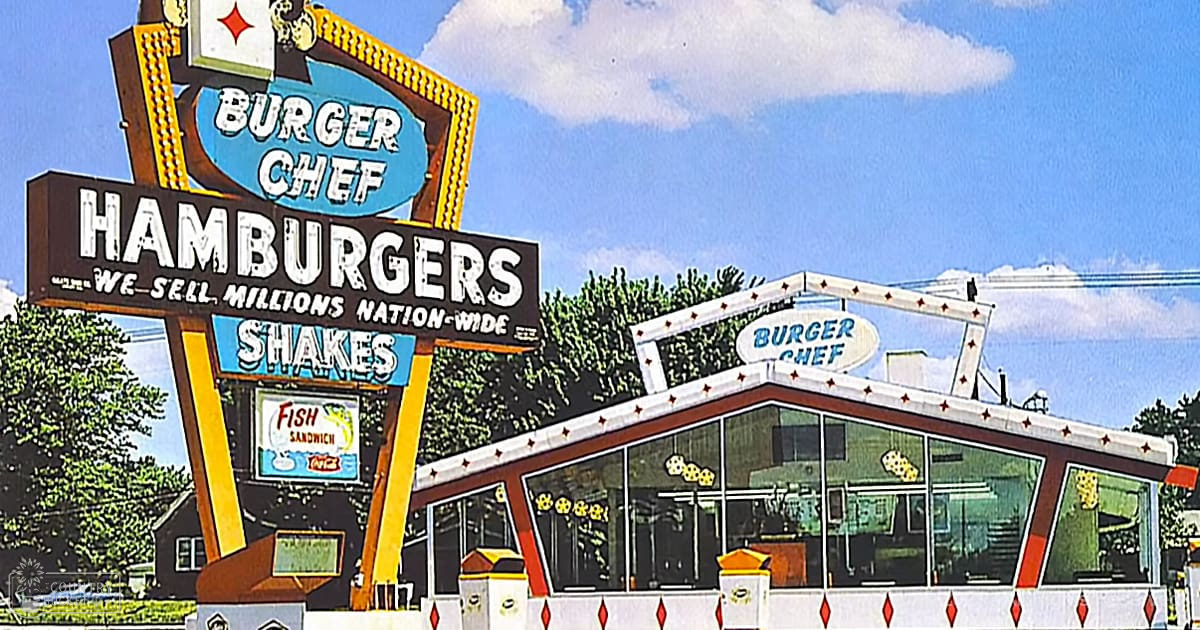Burger Chef restaurant sign and building in an outdoor setting with trees, clear sky, and retro design.