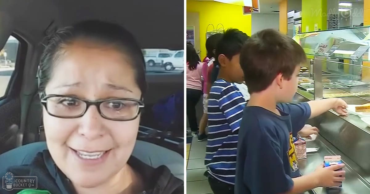 Adult female in a dark shirt with green trim inside a vehicle at a fast-food restaurant; two children wearing casual t-shirts and standing near a counter displaying food items.