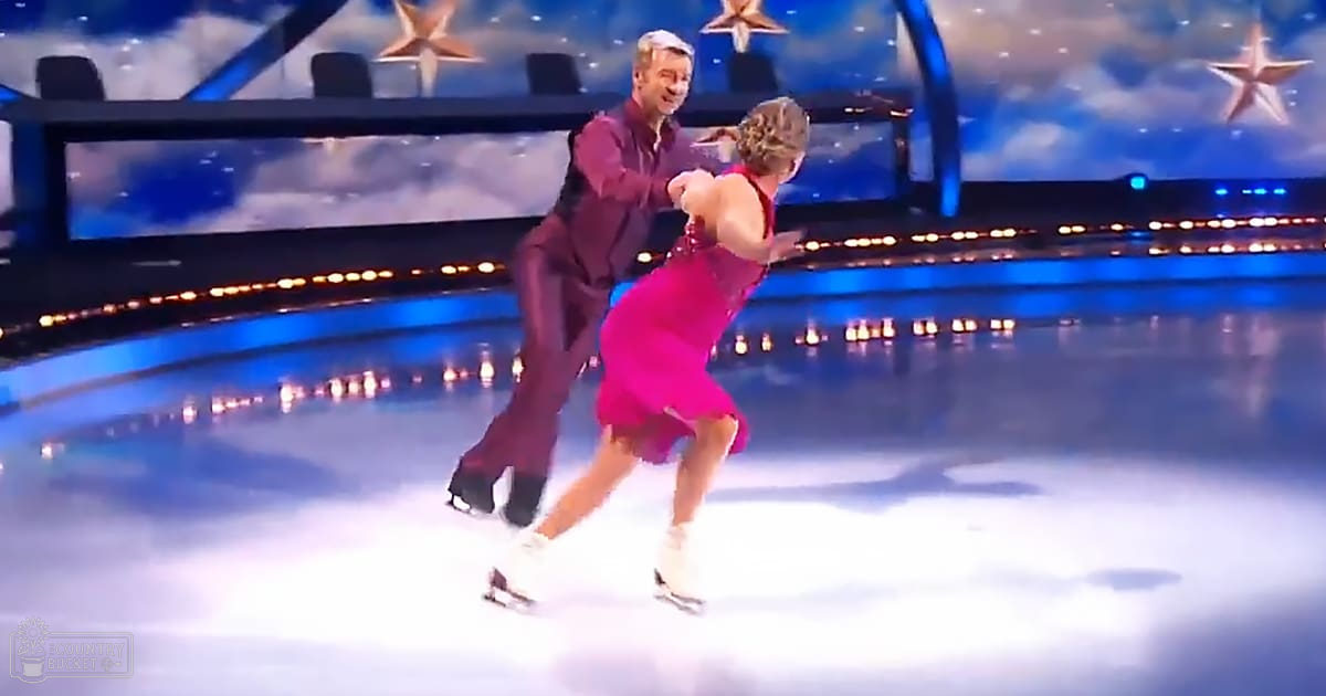 A middle-aged male skater in a dark maroon suit and white shirt, paired with an ice skating rink backdrop with stars and a cityscape at night.