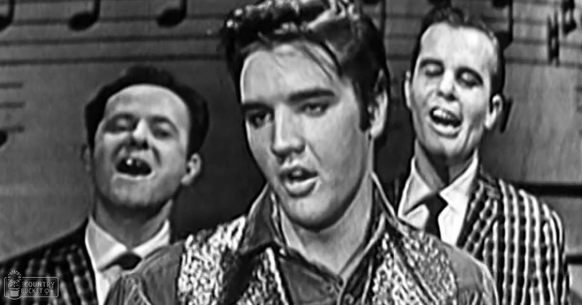 Young adult males performing indoors, wearing suits, a sequined jacket, and a striped shirt; setting suggests mid-20th century stage performance.
