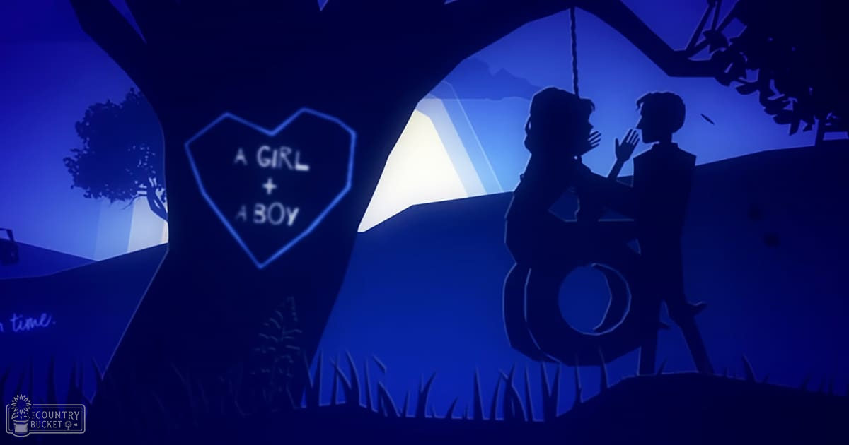 A couple dancing outdoors at night by a campfire with silhouettes of trees and hills in the background.