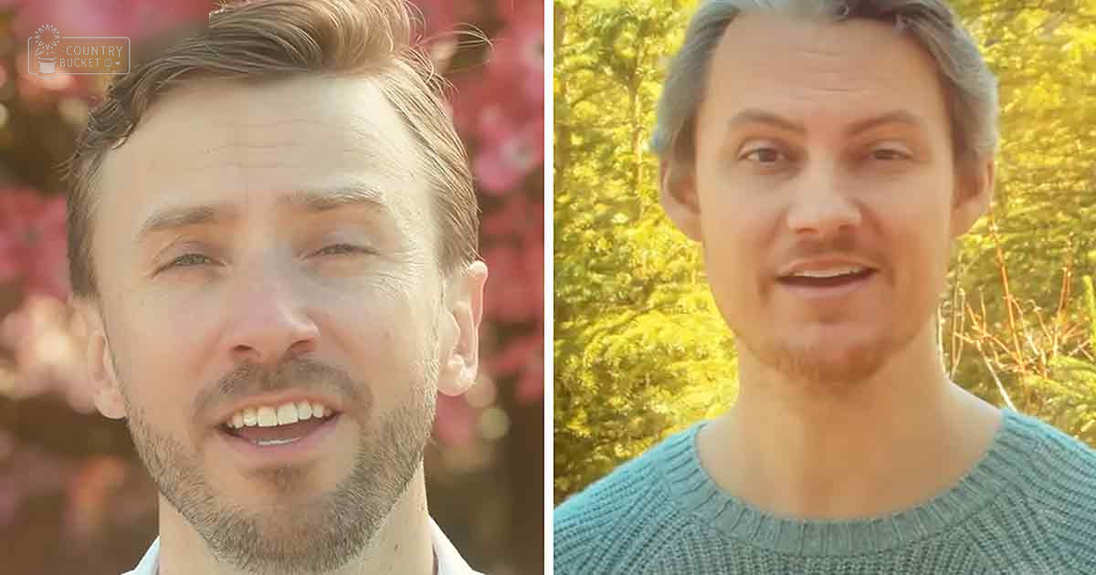 Two adult males wearing casual attire outdoors with a natural backdrop of trees and blooming flowers, late afternoon or early evening lighting.