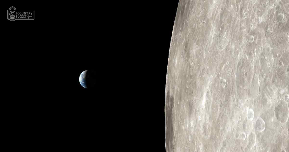 Outer space view with Earth illuminated by sunlight against a dark void, with the Moon in the foreground.