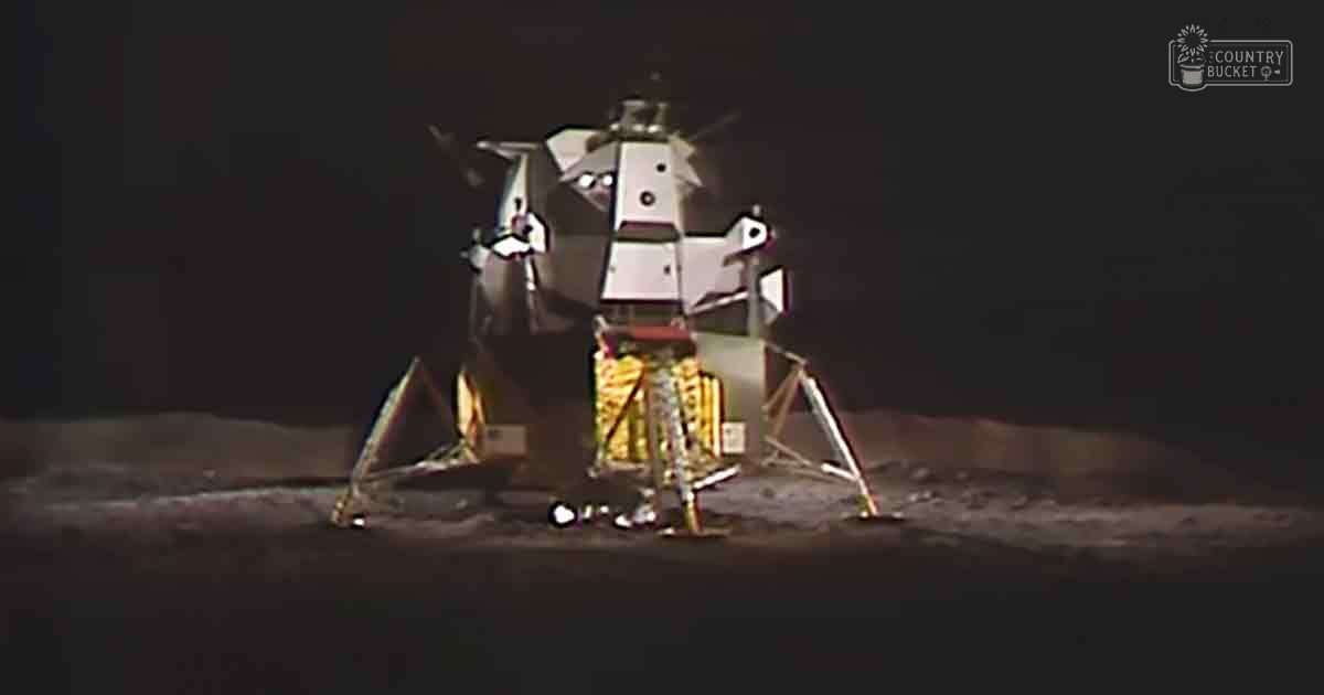 A barren lunar landscape with a lunar module on its surface, set under a night sky.