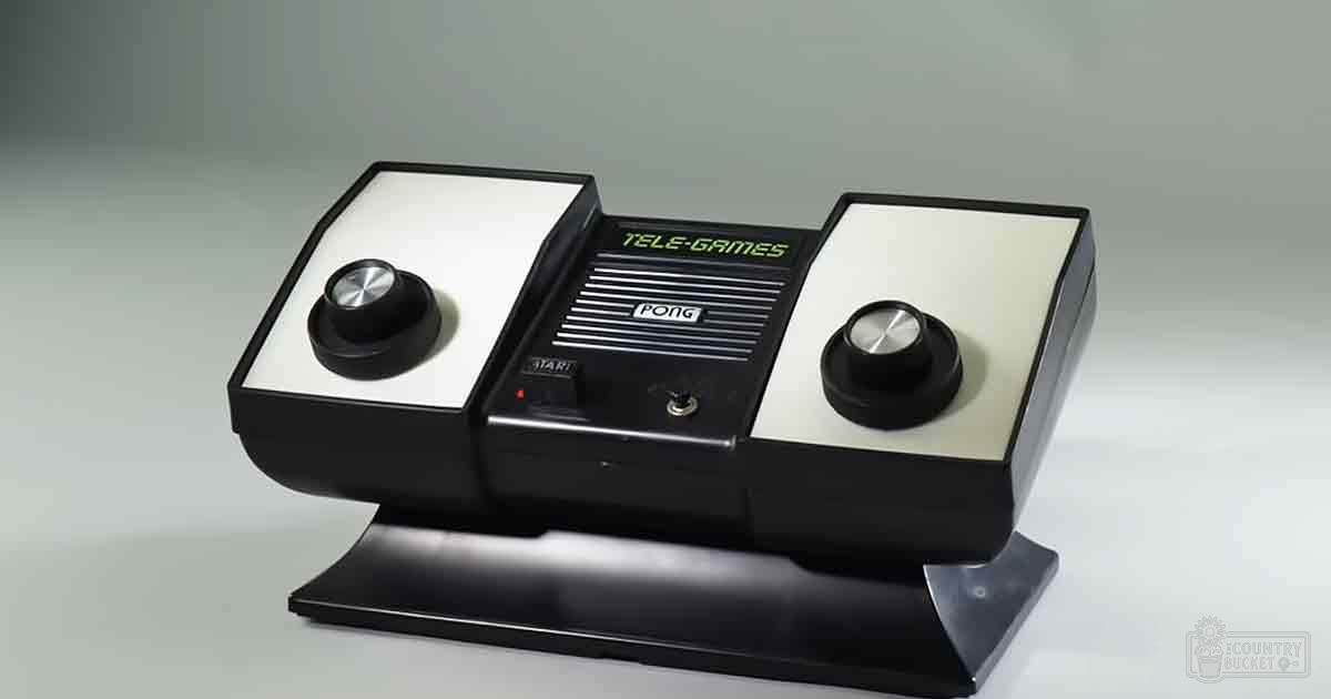 A vintage Pong console labeled 'TELE-GAMES' sits indoors under neutral lighting.
