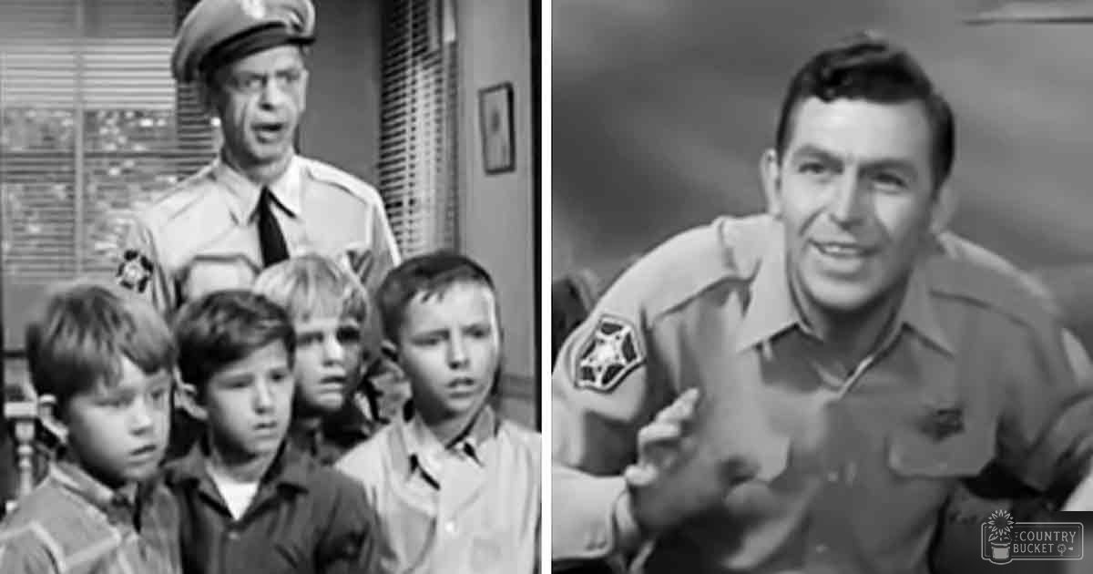 Children in 1950s school uniforms and an adult police officer inside a police station with natural daylight streaming through blinds, indoor setting, daytime, mid-20th century, black-and-white scene
