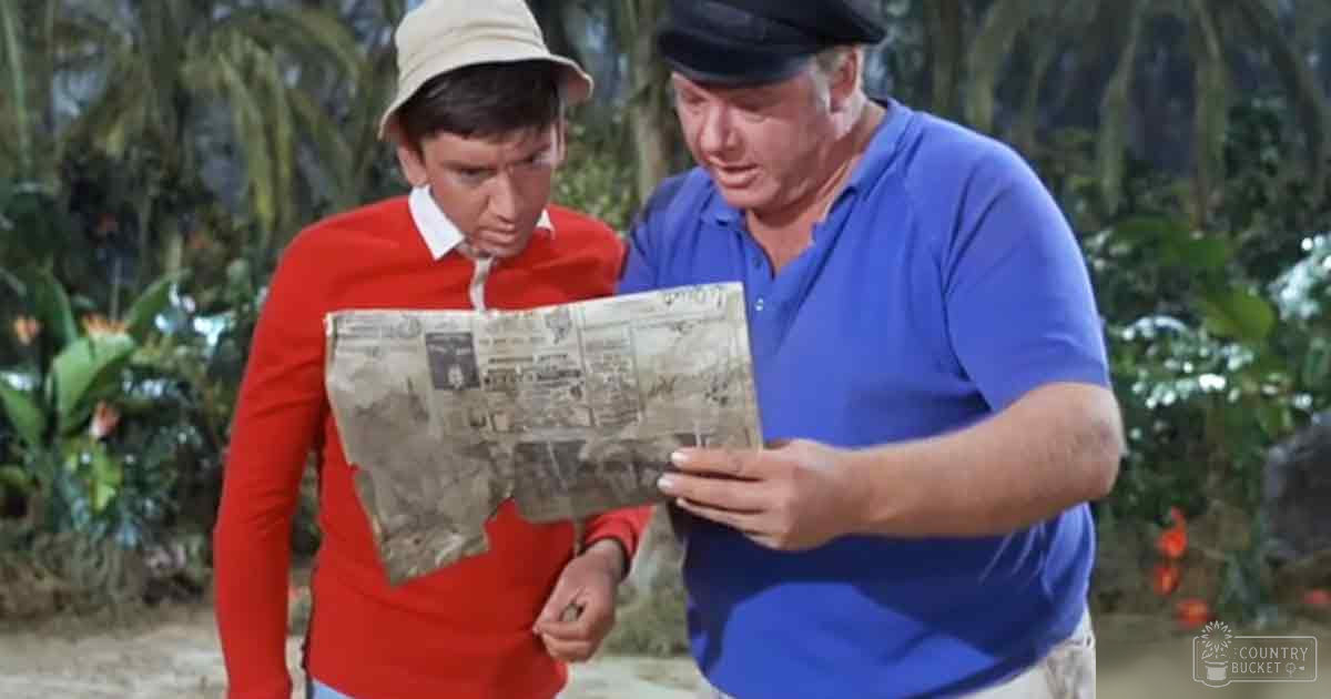 Two individuals in a tropical setting examining an old map together.