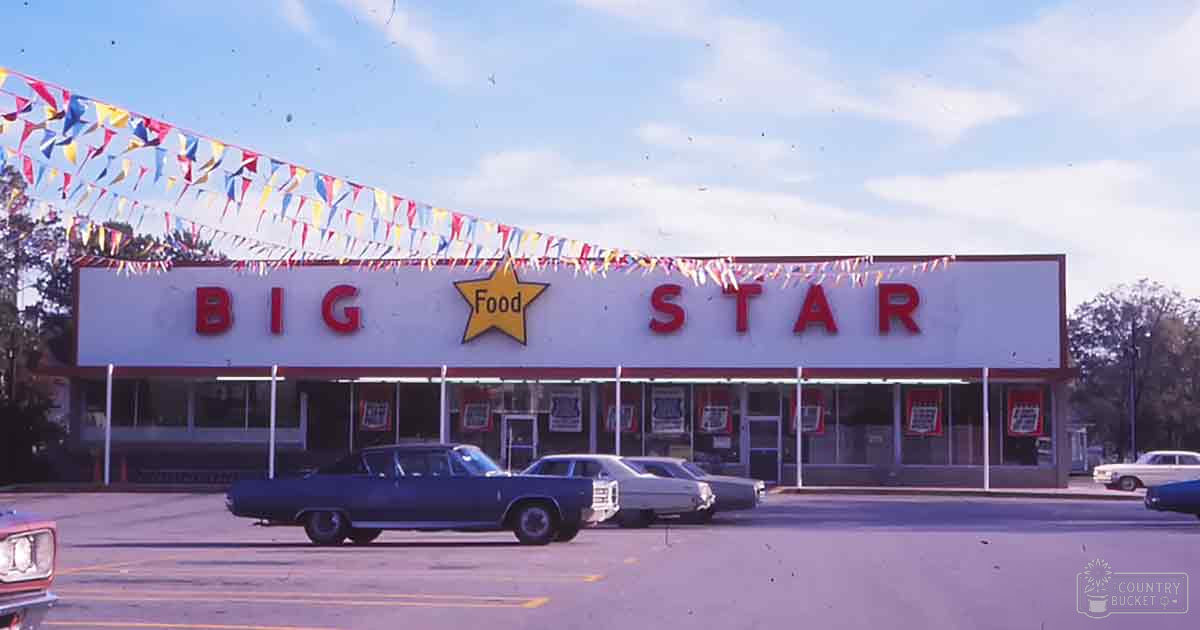 A clear daytime scene with 'Big Star Food' sign and colorful bunting in an urban setting
