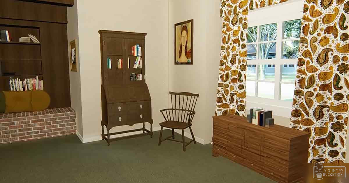 A room with vintage decor and a brick fireplace, likely in a living or study area during daytime.
