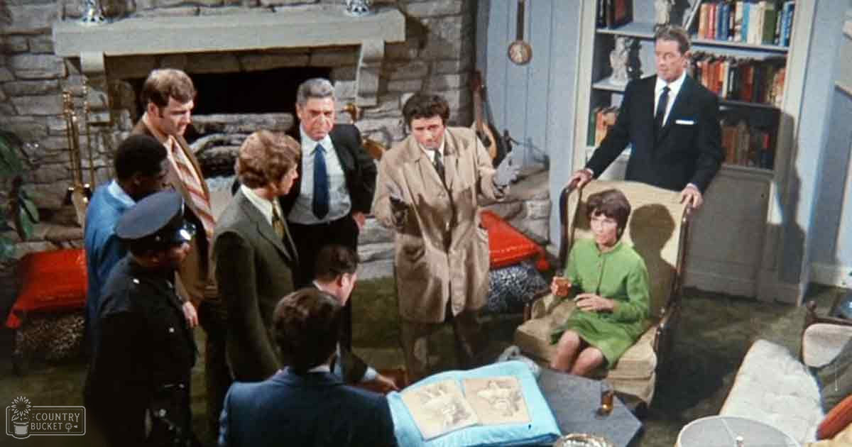 A group of middle-aged and older adults in a mid-20th century living room, wearing suits and dresses with natural lighting.