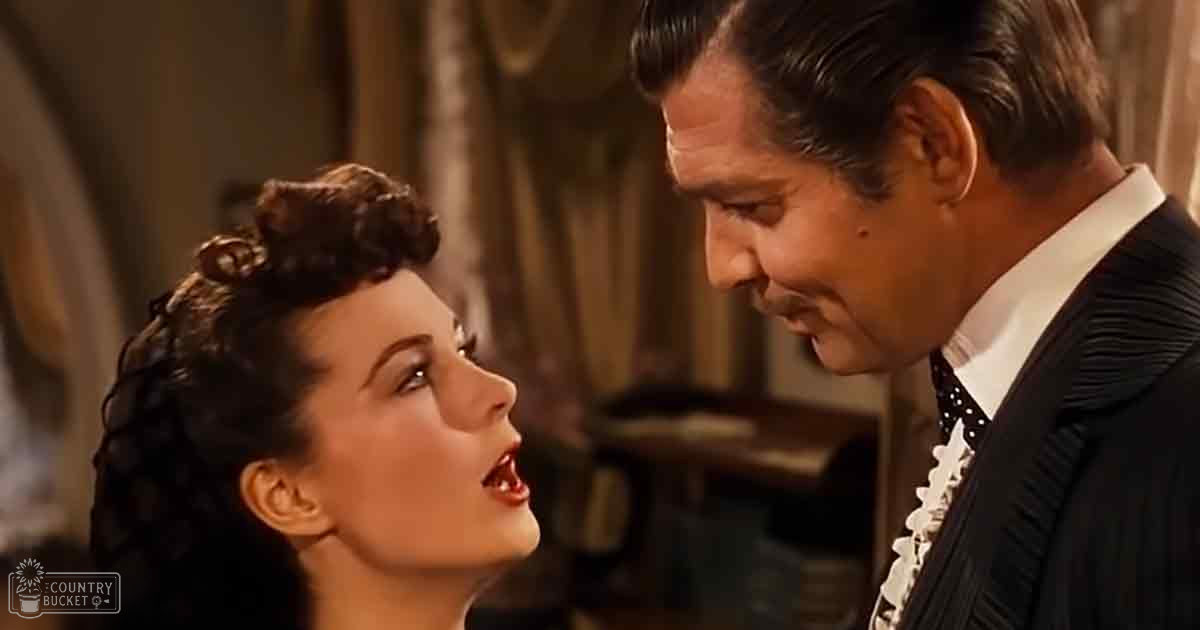 An indoor scene reminiscent of 'Gone with the Wind,' with two adults, one wearing a dark formal dress and another in a dark suit jacket, set against an elegant room backdrop.