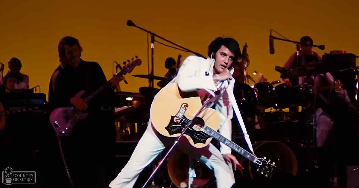 Performers in a vibrant 1960s-style indoor concert setting with warm yellow stage lighting and classic attire.