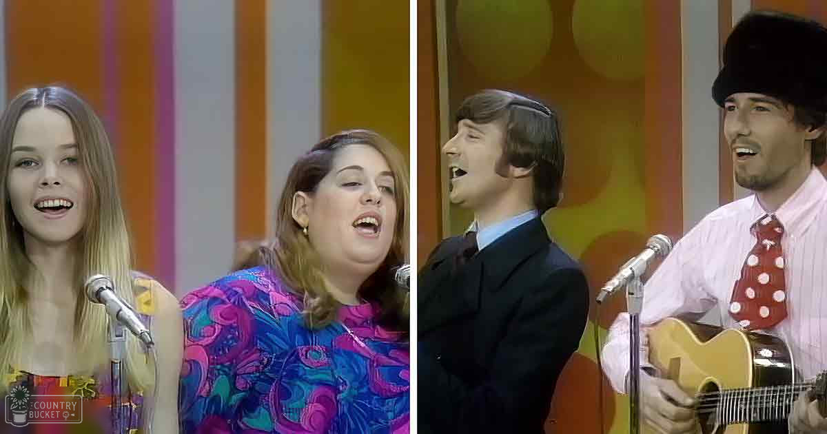 Young adult female in a colorful patterned dress performs alongside an adult male in a dark fur hat, with microphones indicating a recording or performance environment.