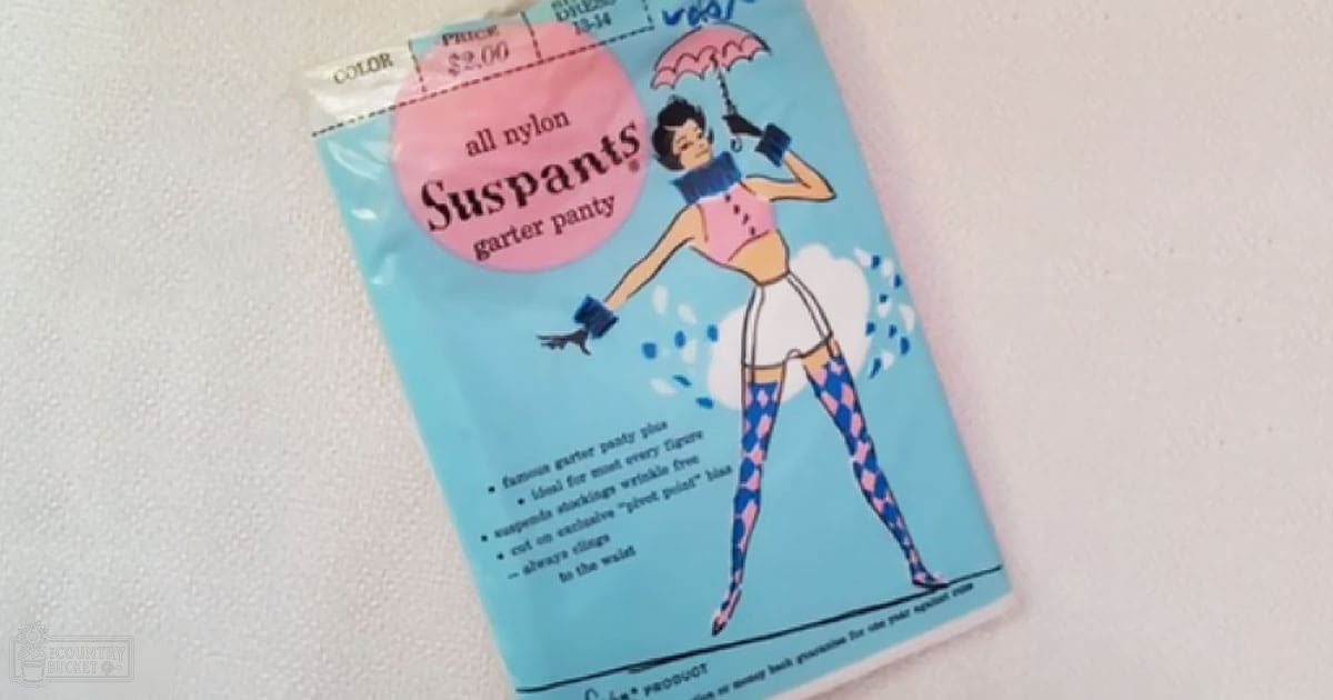 Vintage advertisement for Suspants garter panties, with an illustration of a youthful adult female in pink top and white shorts against a plain background with even daytime lighting.