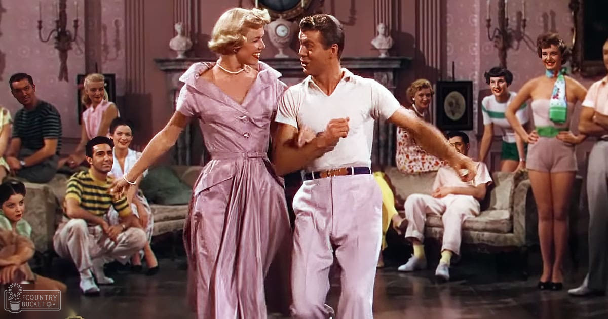 A mid-20th century American social setting with couples dancing and adults seated in a warmly lit room adorned with vintage furniture and decor.
