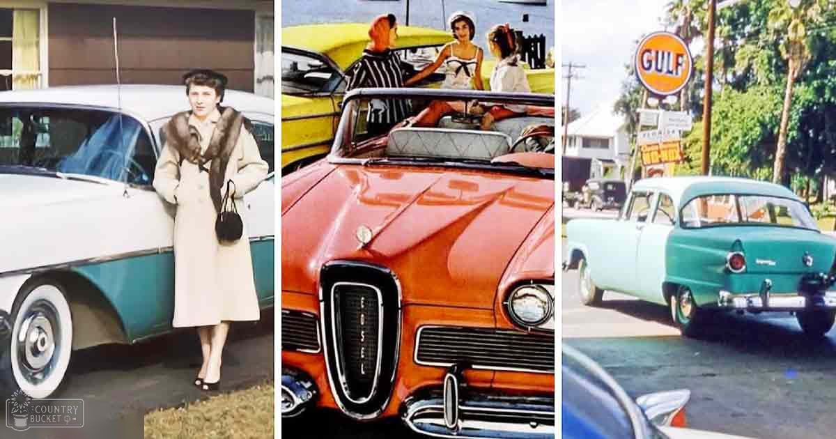 A vintage car scene in a suburban setting with palm trees and clear sky during what appears to be summer or spring.