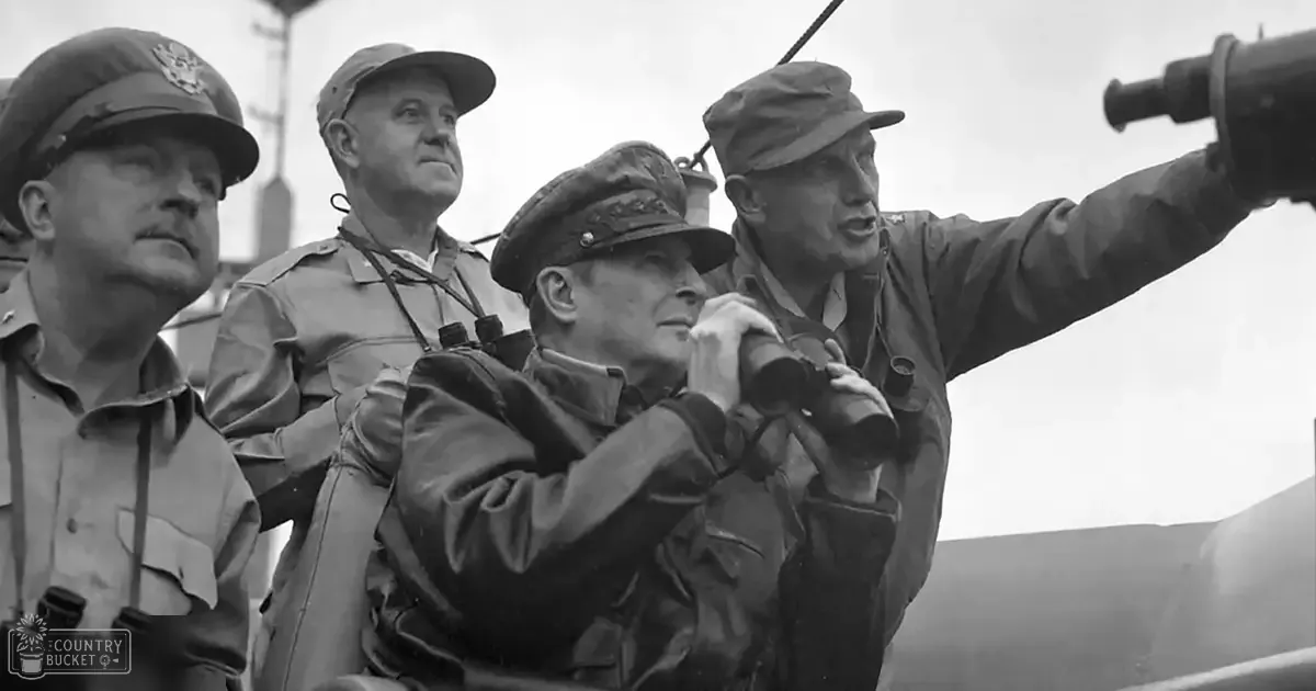 A group of military personnel observing something in the distance with binoculars aboard a ship under an overcast sky.