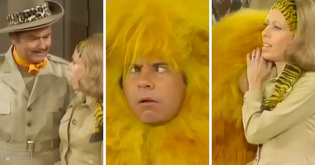 Adult male singers in a comedic studio set with one wearing bright yellow feathers, another in a light-colored trench coat, and the third in a patterned jacket against neutral walls.
