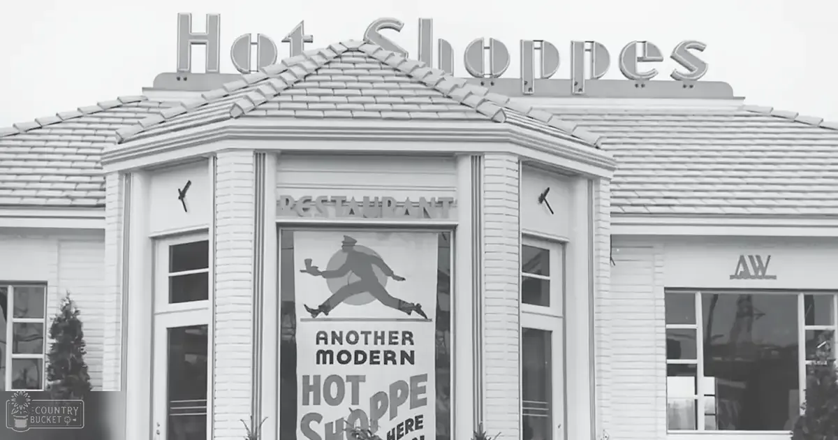 The exterior of 'Hot Shoppes' restaurant with a sign reading 'Another Modern Hot Shoppe Here.' A large window displays an advertisement with a silhouette running, holding what appears to be a drink. The setting is outdoors in spring or summer with greenery and overcast light.