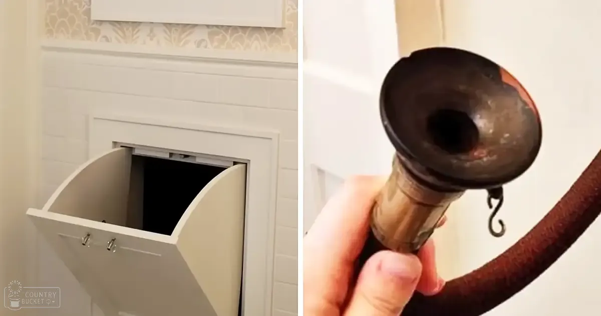 A bathroom setting with white tiled walls, beige wallpaper above tiles, black cylindrical object resembling vacuum cleaner attachment, small metallic hook visible.
