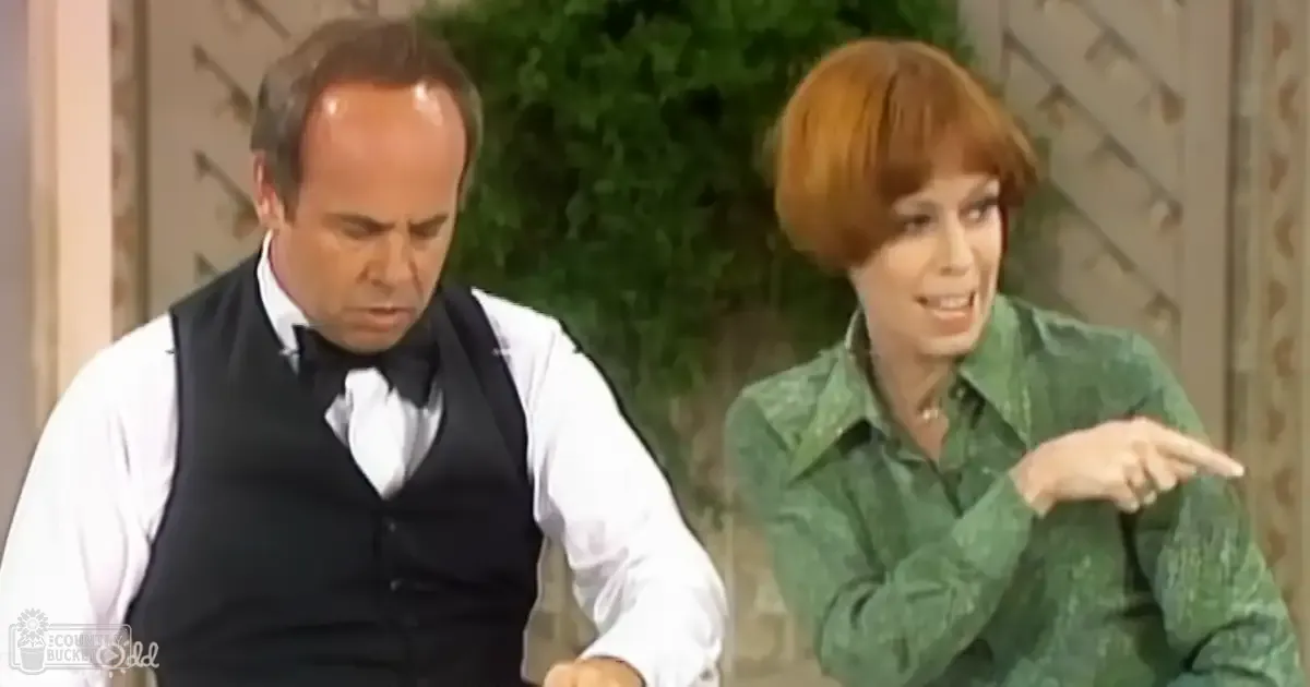 An outdoor scene with greenery and two adults dressed in vintage attire from the mid-20th century; likely spring or summer, natural daylight.