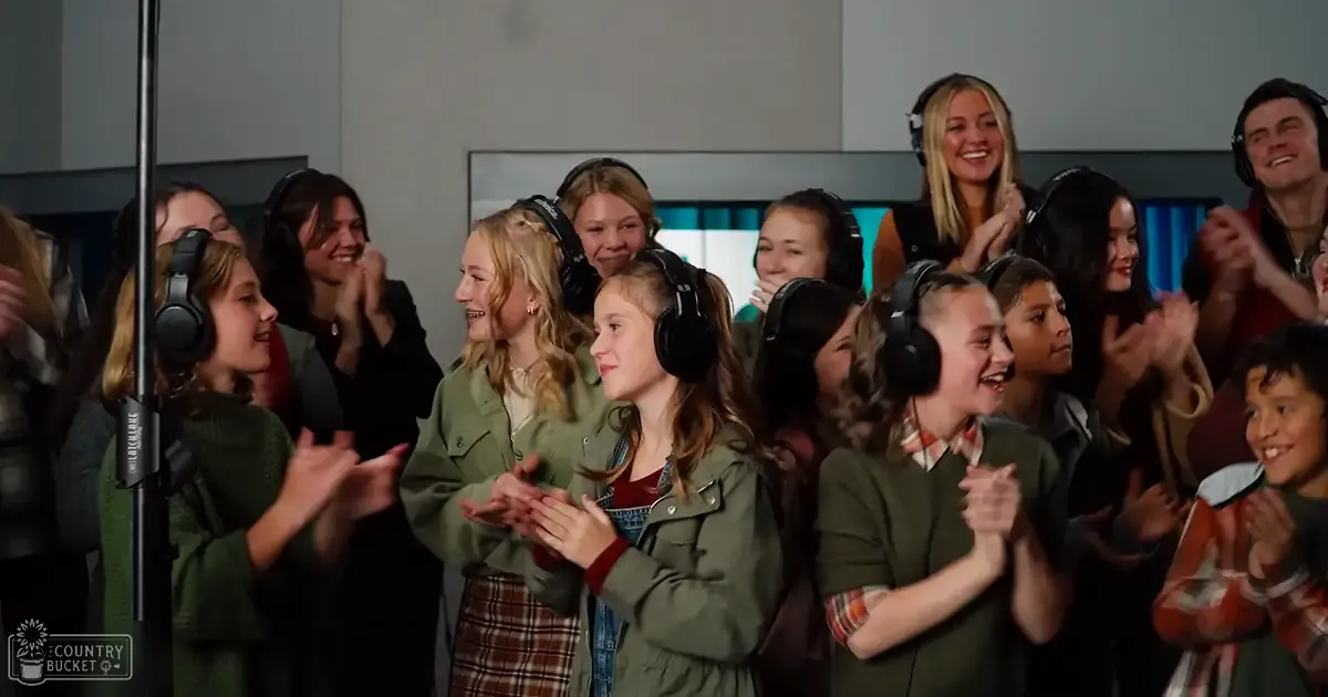 Children in recording studio setting. Group of children, aged 6 to 14 years old, wearing casual jackets and skirts, in a modern style, with green and olive-green colors dominant.
