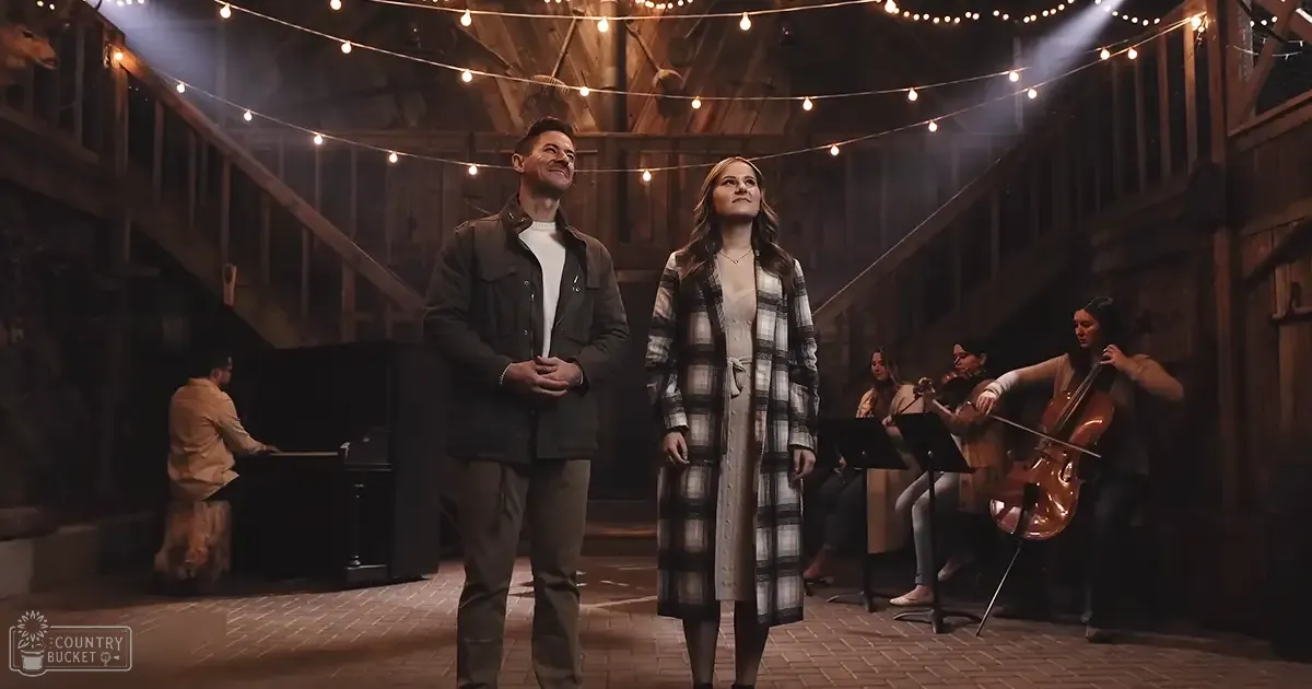A rustic indoor scene with a couple and musicians, string lights hanging from wooden beams, evening lighting.