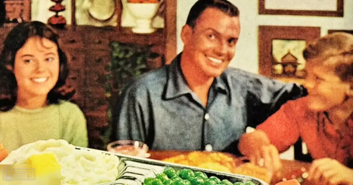 A family dining together at a home setting with warm lighting.
