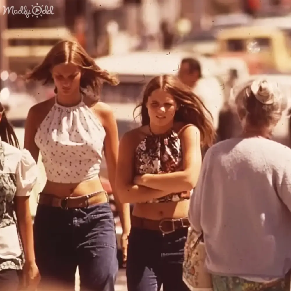 Teenage females in a summer festival setting, wearing casual summer outfits with polka dots and florals.