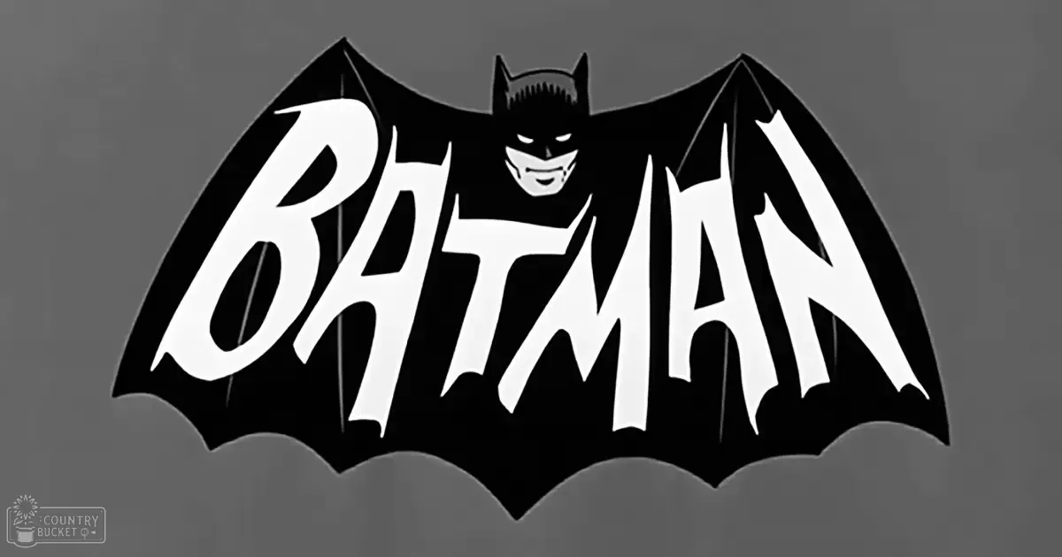 Batman silhouette against a dark gray background with 'BATMAN' text resembling bat wings.