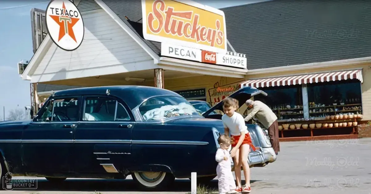 A family with an infant and toddler at Stuckey's Pecan Shoppe, a roadside stop in Texas.