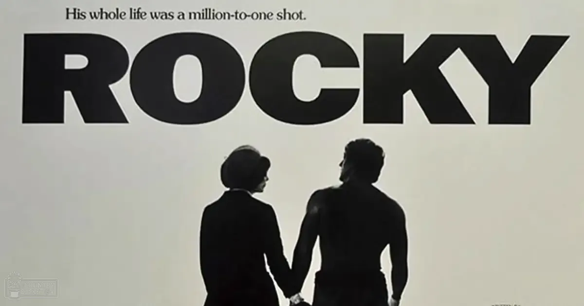 A promotional poster for Rocky, with two silhouetted figures holding hands against a plain white background with bold text at the top reading 'His whole life was a million-to-one shot.'