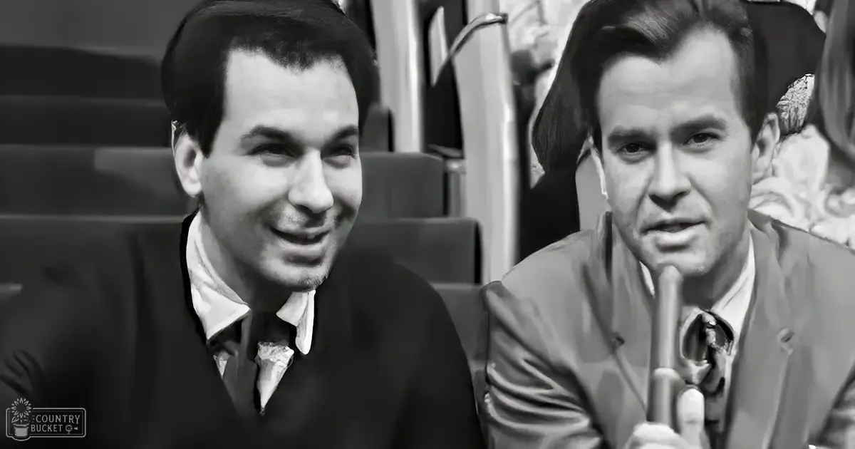 Two young adult males in a public transportation vehicle wearing mid-20th-century style clothing, one holding a microphone suggesting a recording or broadcasting scenario.