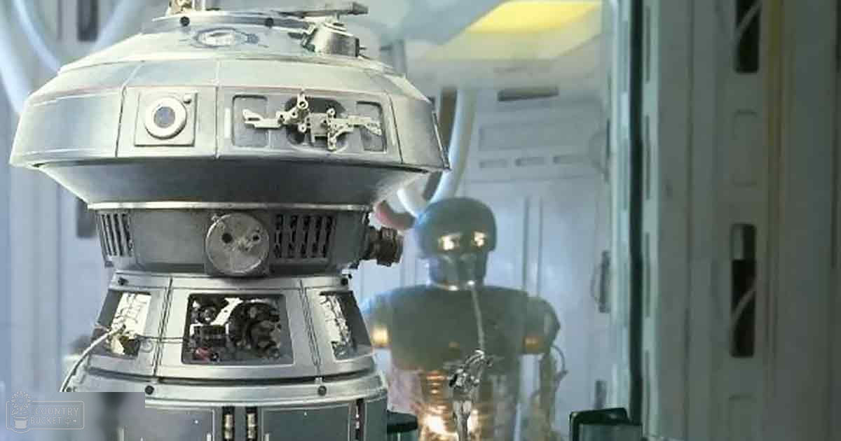 Two futuristic robots in an indoor, metallic spaceship or lab setting with artificial lighting and a cool-toned color palette.