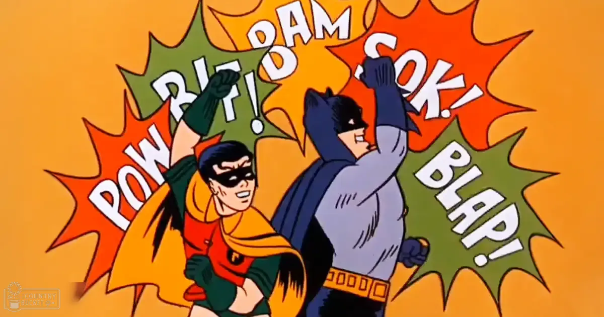 Batman and Robin in their iconic costumes against a bright orange starburst background from a comic book or animated series.