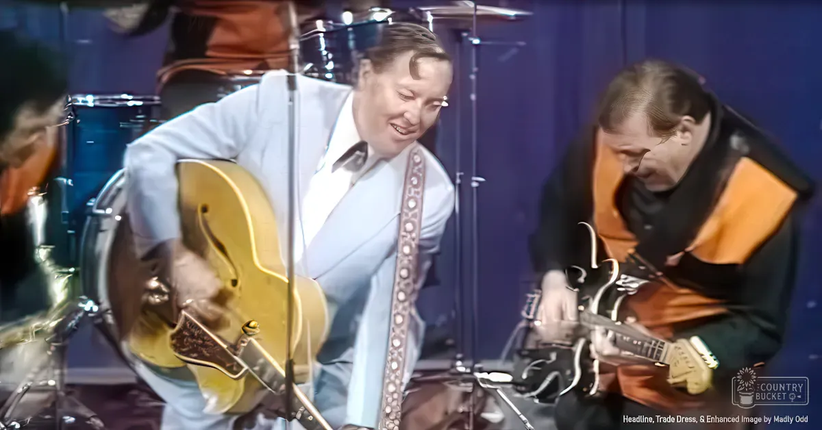 Musical performance scene with two adults wearing mid-20th century attire, dark blue stage backdrop and artificial lighting.