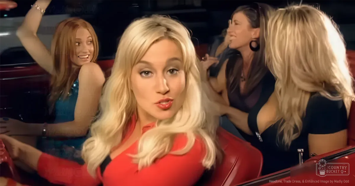 A young adult female with long blonde hair, wearing a red top in an indoor bar or club setting.
