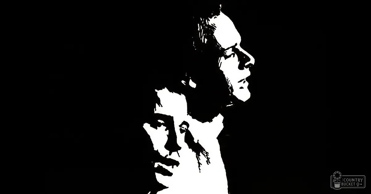 A black and white silhouette of a person with a bird perched on their shoulder, set against a dark background.