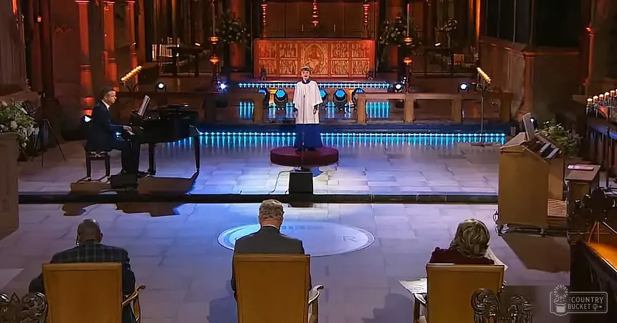 A pianist and a soloist perform on stage in a grand church setting with ornate decorations.